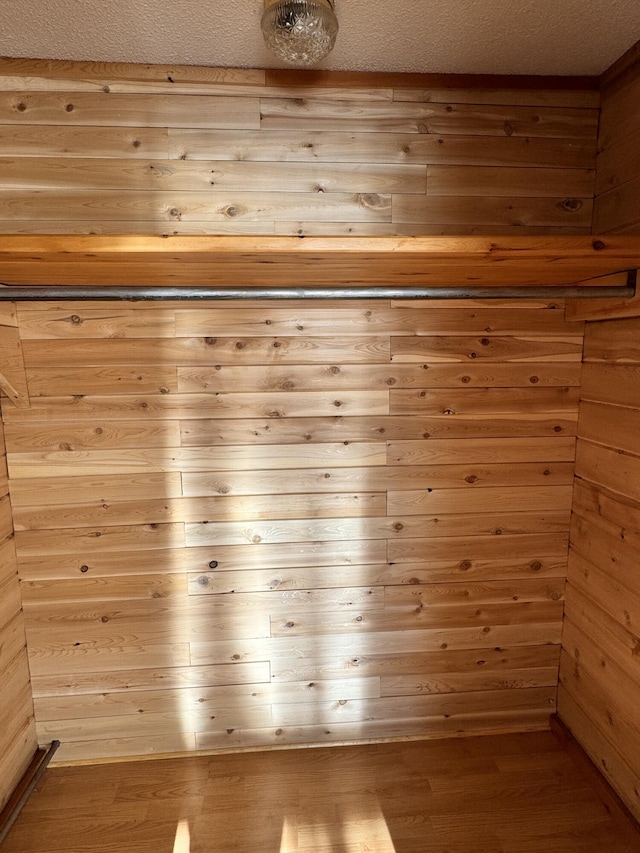 view of sauna with hardwood / wood-style flooring