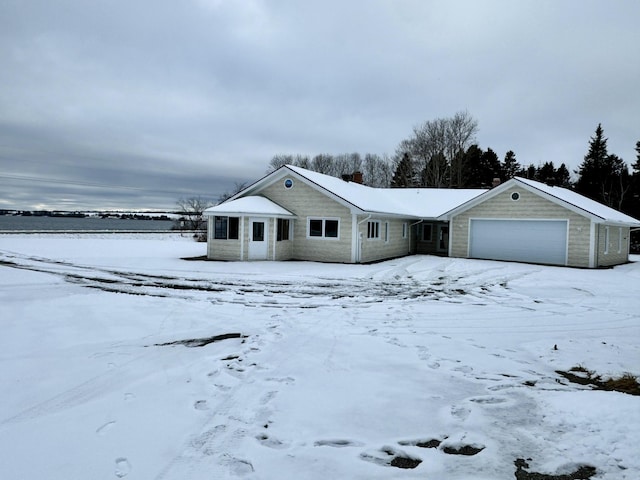 ranch-style house featuring a garage