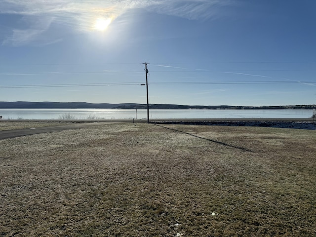 view of yard with a water view