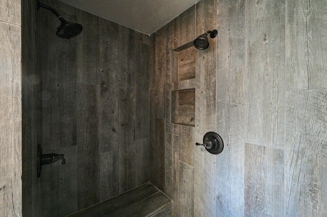 details featuring tiled shower