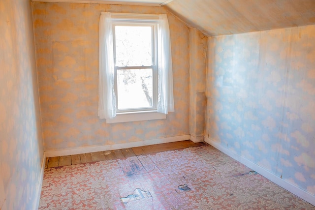 bonus room featuring vaulted ceiling