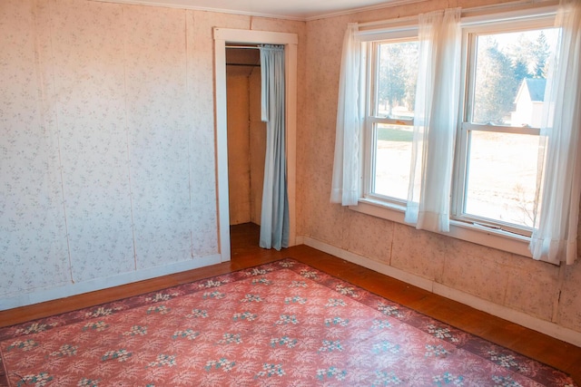 unfurnished room featuring hardwood / wood-style floors