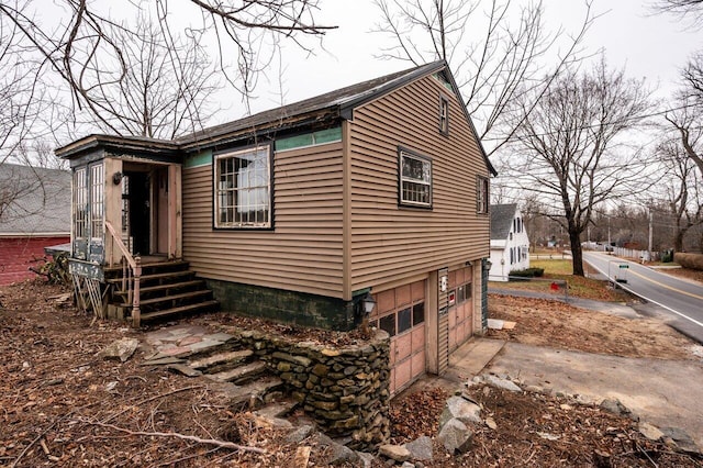 exterior space with a garage