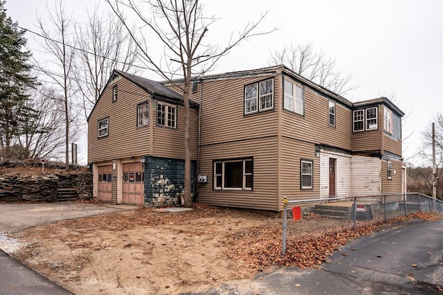 view of front of home featuring a garage