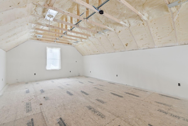 additional living space with lofted ceiling