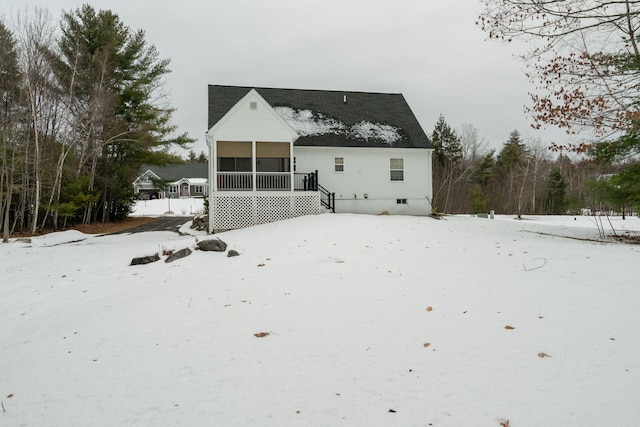 view of snow covered house