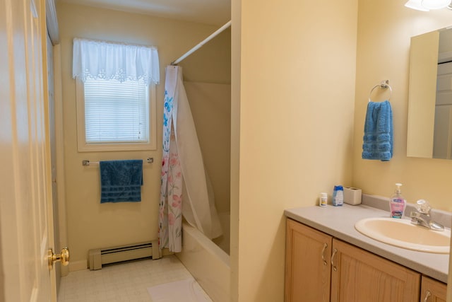 bathroom with shower / tub combo with curtain, vanity, and a baseboard heating unit