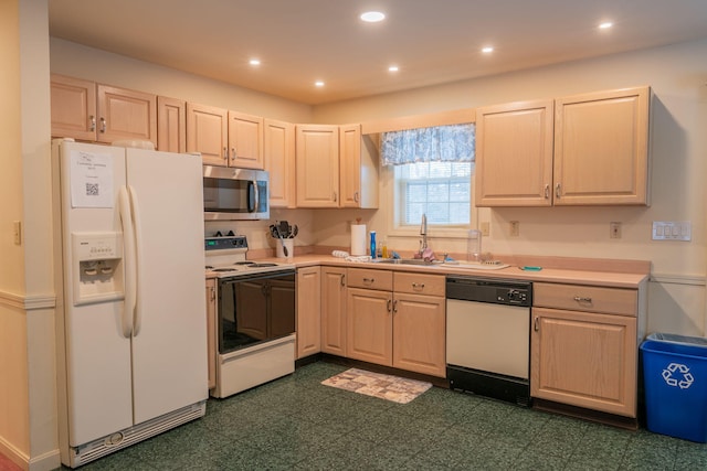 kitchen with white appliances and sink