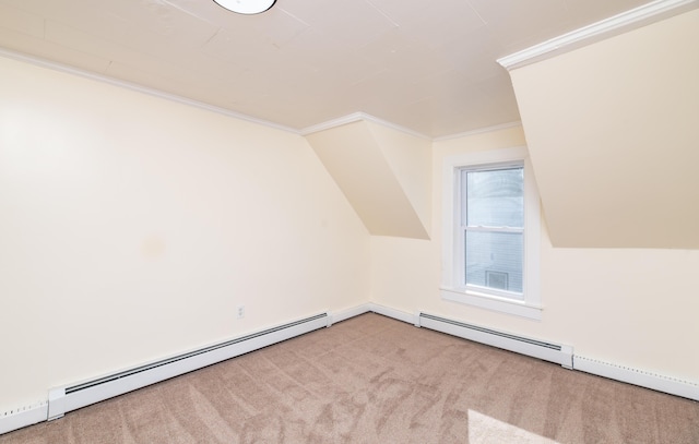 additional living space with a baseboard radiator, lofted ceiling, and light colored carpet