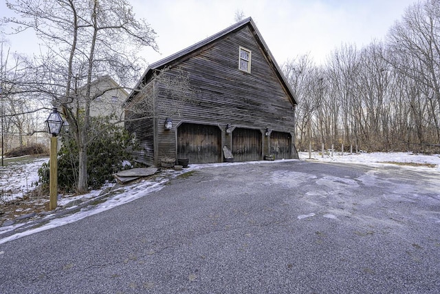 view of snow covered garage