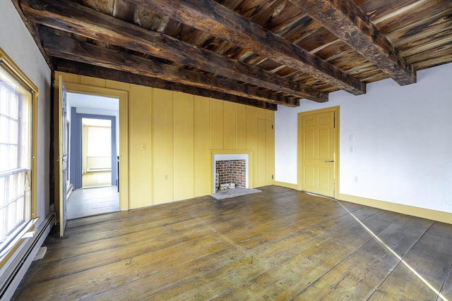 unfurnished living room with a baseboard radiator, wood ceiling, dark hardwood / wood-style flooring, a fireplace, and beam ceiling