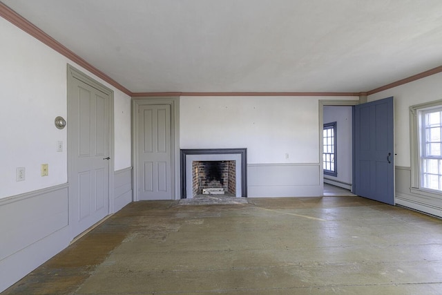 unfurnished living room featuring baseboard heating and ornamental molding