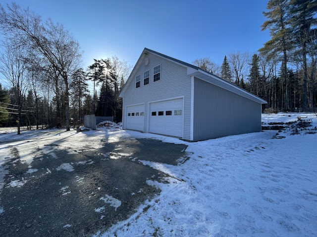 view of snow covered garage