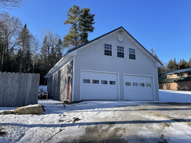 view of snow covered garage