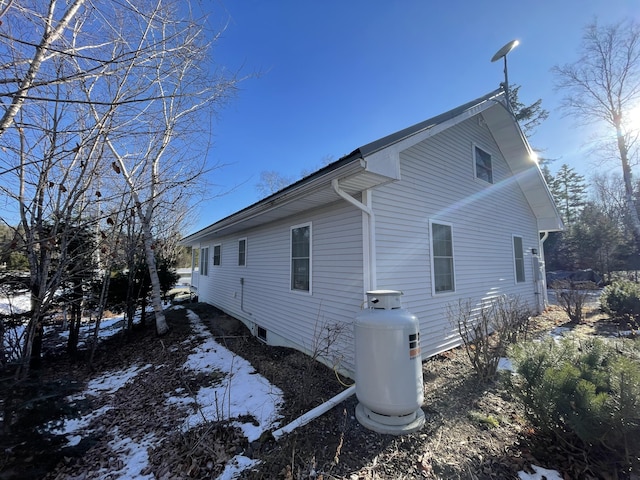 view of snow covered property