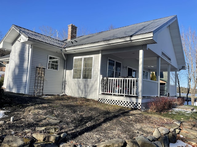 view of home's exterior featuring a porch