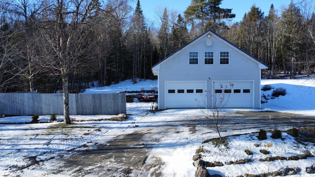 view of snow covered garage