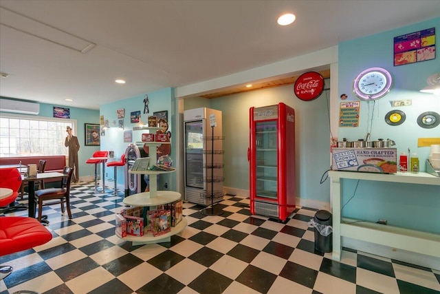 playroom featuring an AC wall unit