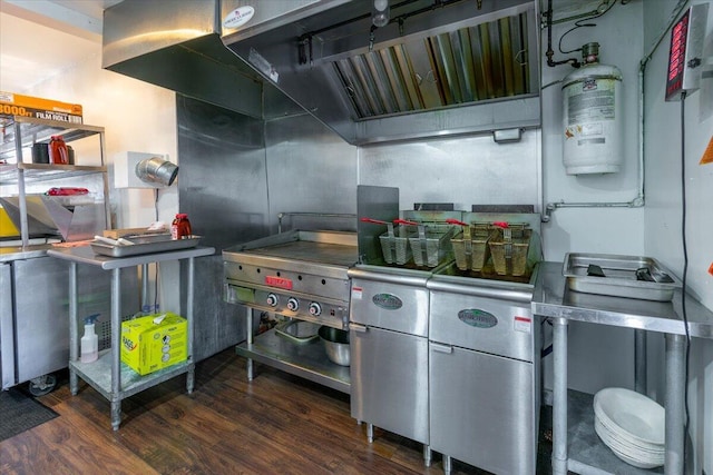 kitchen with dark hardwood / wood-style flooring