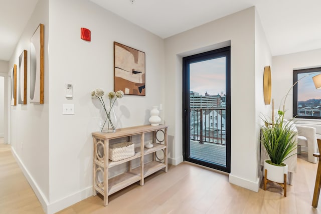 doorway featuring light hardwood / wood-style flooring