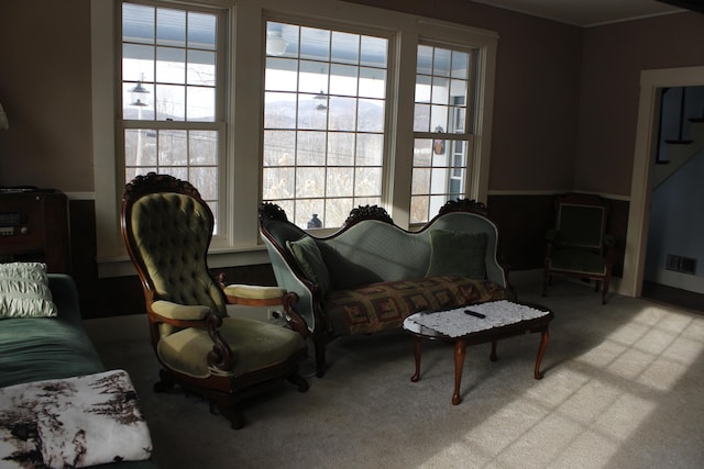 living room featuring light carpet