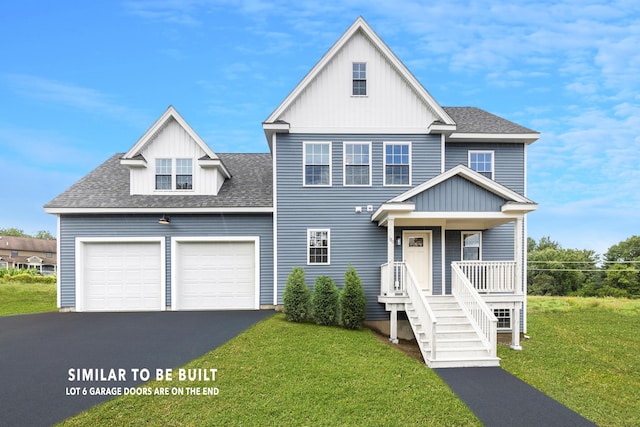 view of front of home featuring aphalt driveway, roof with shingles, covered porch, board and batten siding, and a front yard