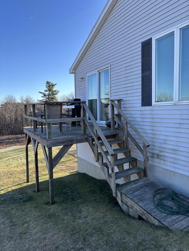 exterior space with a yard and a wooden deck