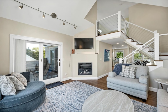 living room featuring french doors and dark hardwood / wood-style floors