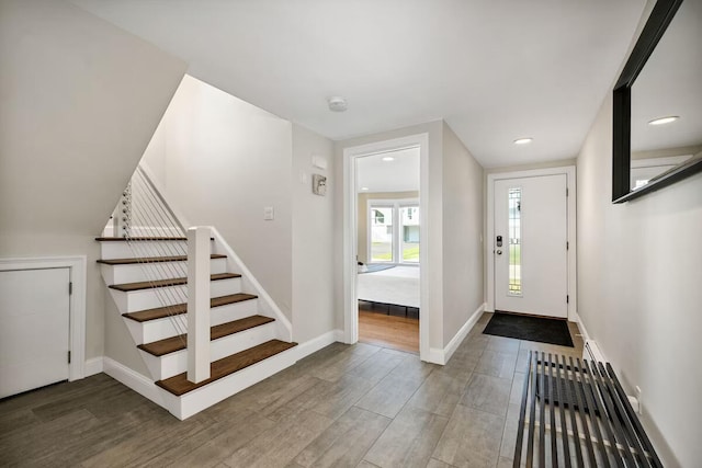 entrance foyer featuring hardwood / wood-style floors