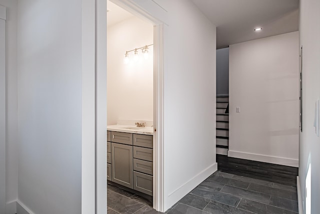 bathroom with hardwood / wood-style floors and vanity