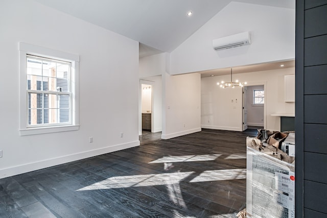 living room featuring a chandelier, dark wood-type flooring, high vaulted ceiling, and a wall mounted AC