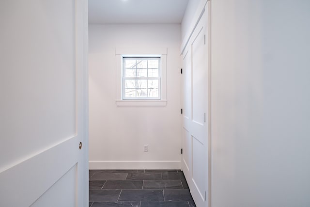 interior space featuring dark tile patterned floors