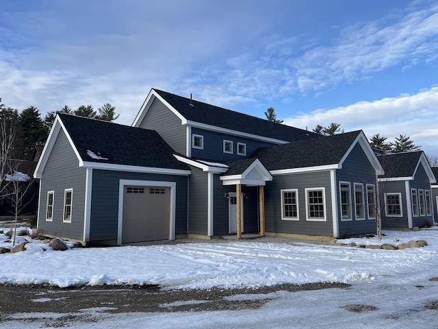 front of property with a garage