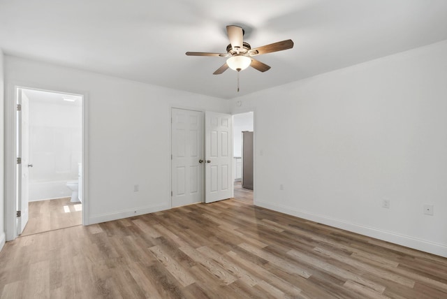 spare room with light hardwood / wood-style floors and ceiling fan