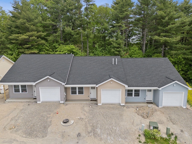 single story home with a garage