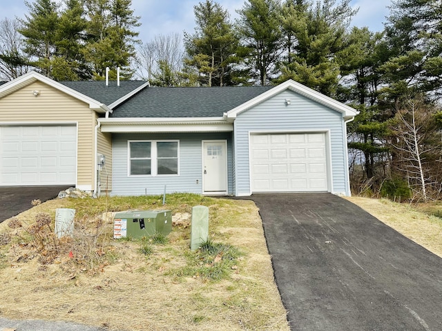 single story home with a garage