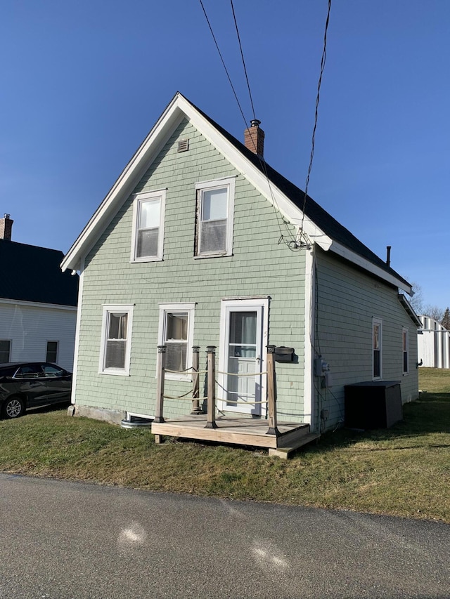 exterior space with a front yard