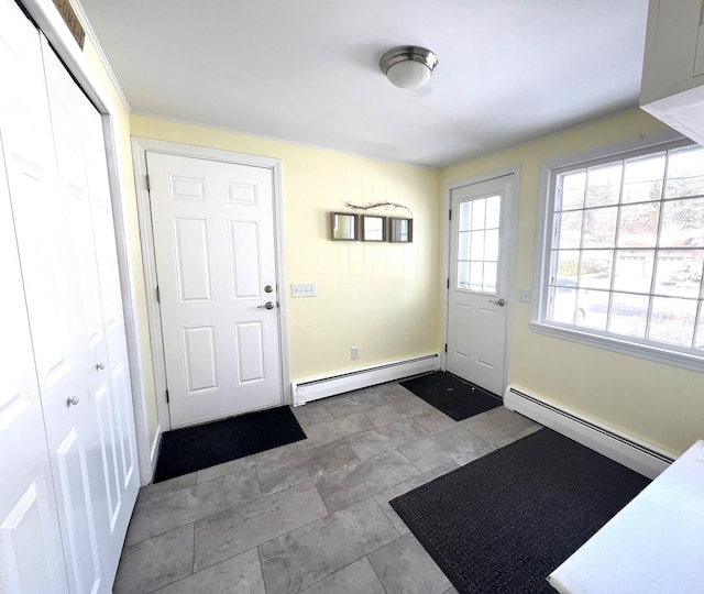 7 Edgewood Dr, Orono, ME 04473 - doorway to outside with baseboard heating and baseboards