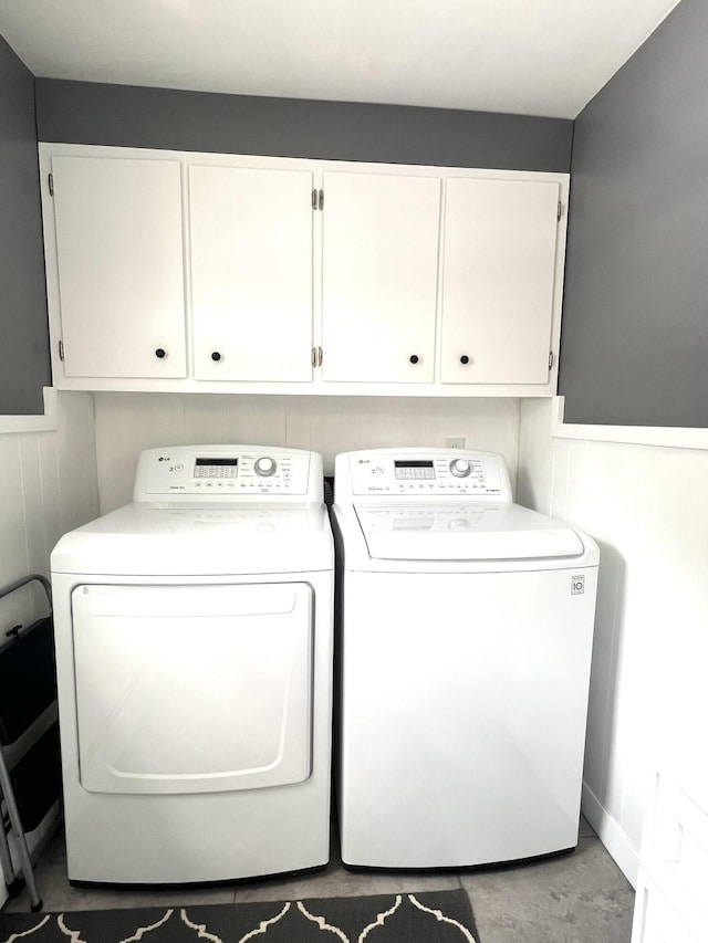 7 Edgewood Dr, Orono, ME 04473 - washroom with washer and dryer, cabinet space, and a wainscoted wall