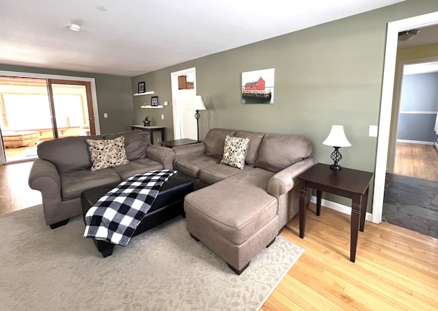 7 Edgewood Dr, Orono, ME 04473 - living area with light wood finished floors and baseboards