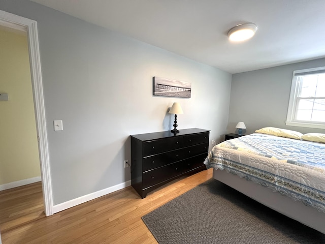 7 Edgewood Dr, Orono, ME 04473 - bedroom with light wood-style flooring and baseboards