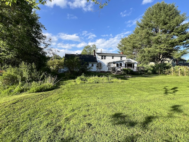 7 Edgewood Dr, Orono, ME 04473 - view of grassy yard featuring a wooden deck