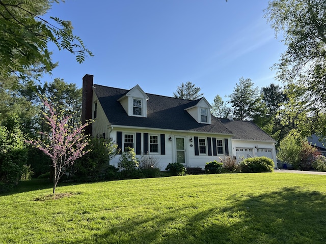 7 Edgewood Dr, Orono, ME 04473 - cape cod-style house featuring an attached garage, a chimney, a front yard, and roof with shingles