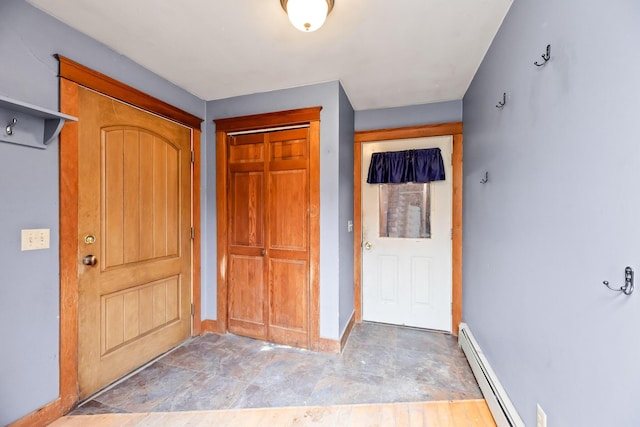 entryway featuring baseboard heating