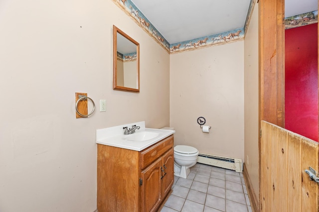 bathroom featuring baseboard heating, tile patterned flooring, vanity, and toilet