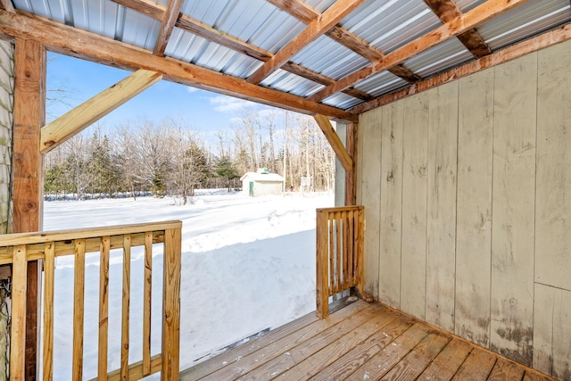 view of snow covered deck