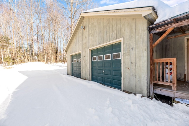 view of snow covered garage