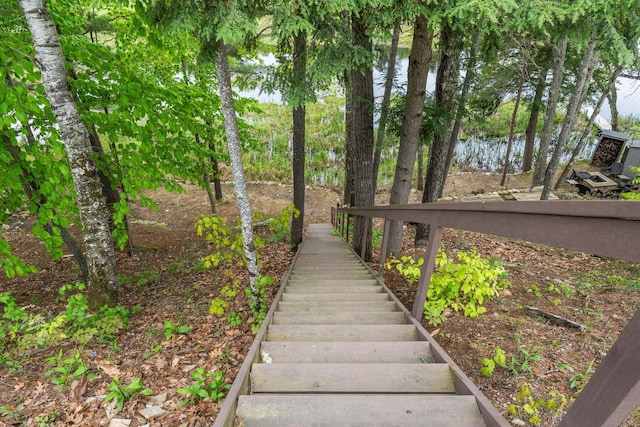 170 Red Gate Ln, Acton, ME 04001 - staircase featuring a water view