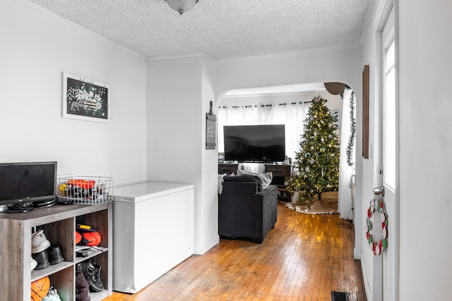 office space featuring light hardwood / wood-style floors and a textured ceiling