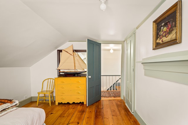 681 Sedgwick Ridge Rd, Sedgwick, ME 04676 - bedroom featuring hardwood / wood-style flooring and vaulted ceiling